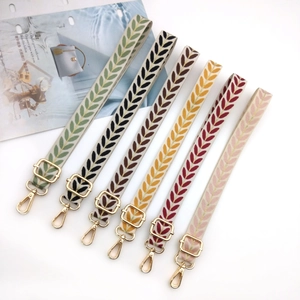 Adjustable leaf pattern crossbody phone straps with gold hardware in six colors
