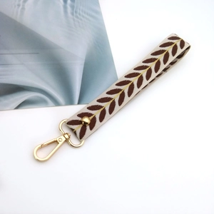 Leaf pattern fabric keychain strap with golden lobster clasp and vintage embroidery finish