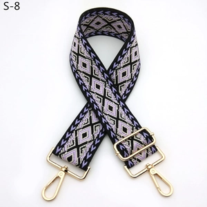 Adjustable woven shoulder strap with purple geometric pattern and gold metal hooks