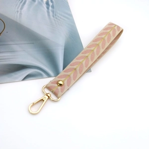 Pink leaf patterned fabric wrist strap keychain with gold rotating lobster clasp