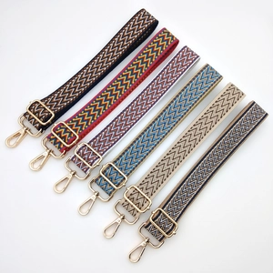 Bohemian woven shoulder straps for bags featuring ethnic geometric patterns and gold clips
