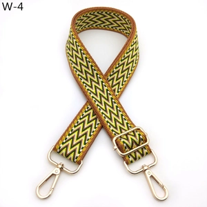 Close-up of ethnic woven replacement strap with yellow and green chevron pattern