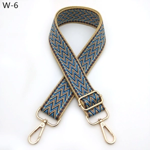 Adjustable woven strap with blue geometric V-pattern and polished gold metal hooks