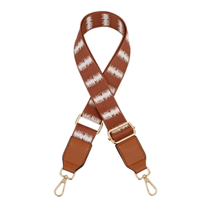 Ethnic style woven canvas bag strap with brown leather ends and gold metal hardware