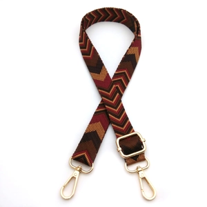 Adjustable woven purse strap with bohemian geometric pattern and gold-tone lobster claws