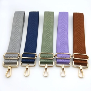 Chevron pattern bag straps in multiple colors with gold-tone metal hardware