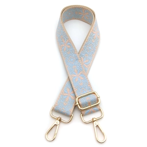 Adjustable wide replacement shoulder strap with blue floral jacquard weave and gold hooks