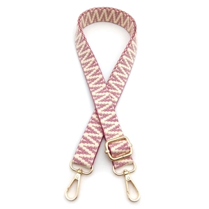 Tracolla intrecciata bordeaux e beige con motivi geometrici e moschettoni dorati