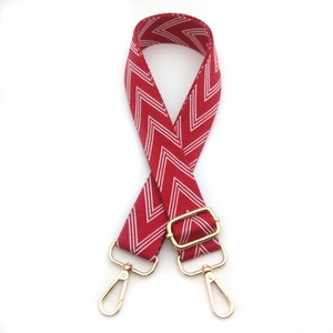 Red and white herringbone woven strap with golden metal hooks for crossbody bags