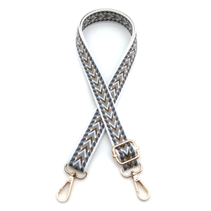 Adjustable ethnic jacquard bag strap with arrow pattern and gold metal hooks