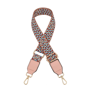 Adjustable colorful woven shoulder strap with pink leather ends and gold metal hooks