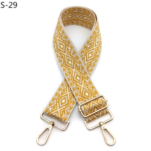 Adjustable geometric jacquard woven bag strap with light gold metal swivel hooks