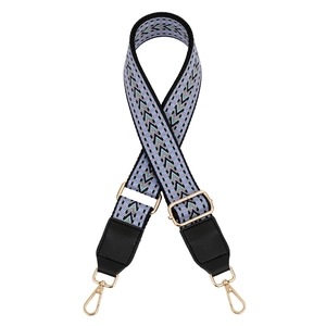 Adjustable woven shoulder strap with geometric wave pattern and gold lobster clasps