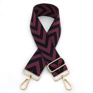 Adjustable crossbody bag strap with pink chevron pattern and gold metal lobster clasps