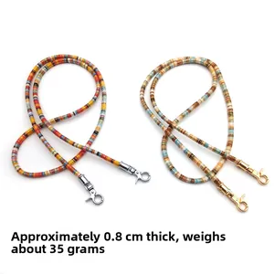 Detail of colorful bohemian hand-woven beaded strap showing 0.8cm width and metal clasps