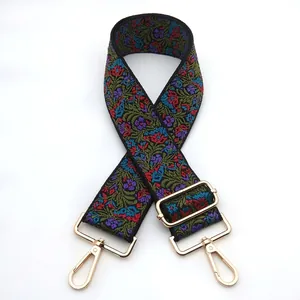 Ethnic style embroidered wide bag strap with floral pattern and gold metal hardware