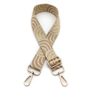 Adjustable woven shoulder strap for bags with wave pattern and gold metal lobster clasps