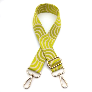 Adjustable woven shoulder strap for handbags with green geometric waves and gold hardware
