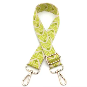 Adjustable beige and green geometric diamond pattern guitar style shoulder strap with gold hooks