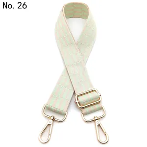 Detail view of pink and light green striped adjustable replacement bag strap No.26