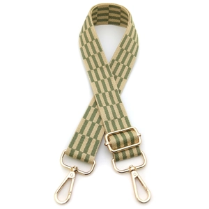 Adjustable checkerboard shoulder strap with green and beige pattern and gold metal hooks