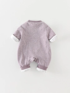 Long-sleeved baby romper in soft lavender purple featuring snap button crotch and ribbed cuffs