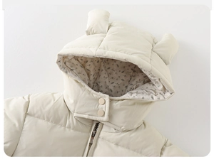 Close-up of baby winter hoodie featuring cute bear ears and floral lining detail