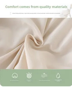 Detail of high-density cream silk fabric with soft texture and breathable weave