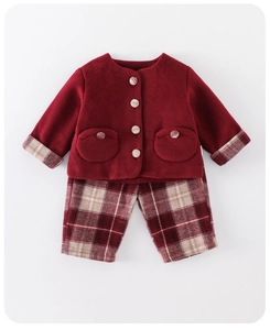 Detailed flat lay of baby girl's red woolen jacket with plaid buttons and matching pants