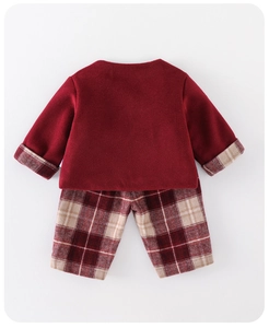 Detailed view of baby girl red wool coat set with plaid trousers for winter festivals