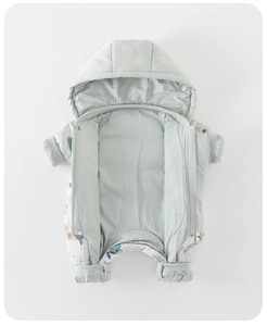 Detail view of baby hooded down romper showing quilted texture and double-zipper closure