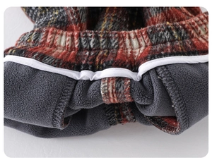 Detail of red plaid toddler outfit showing thick fleece lining and elastic waist