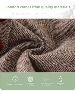 Detail of herringbone tweed fabric with colorful yarn dots and soft breathable texture