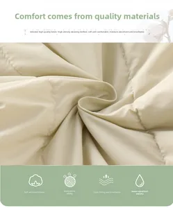 Detail of high-density quilted fabric for kids warm lightweight jacket in creamy white