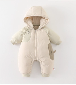 Detail of baby winter romper with front zipper closure and cartoon puppy pocket design