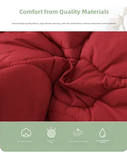 Macro view of red high-density quilted fabric showing soft texture and stitching