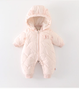 Detail of pink hooded baby romper with floral embroidery and 3D ear accents