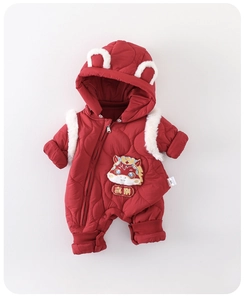 Detail of red quilted baby festive romper with cartoon lion embroidery and fuzzy ears