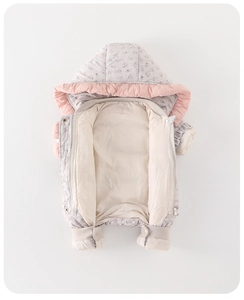 Detail of floral baby winter romper with soft ruffled hood and thick insulated lining