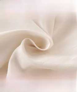 Detail of high-density soft fabric for winter baby jumpsuit showing smooth texture