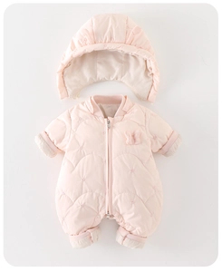 Detail of pink quilted infant snowsuit with wave patterns and ribbed windproof cuffs