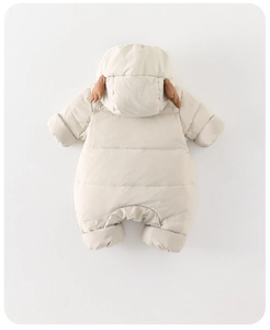 Close-up of baby snowsuit with 3D animal ears on hood and soft quilted down fabric