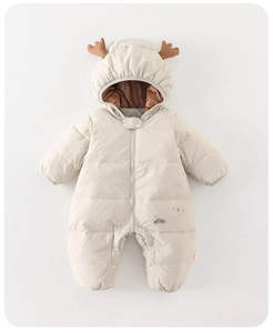 Detailed view of baby snowsuit featuring plush deer antlers and front zip closure