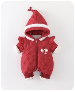 Detailed view of red winter baby romper with white faux fur trim and floral quilting