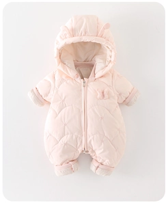 Close-up of pink quilted baby snowsuit featuring bow applique and diamond pattern