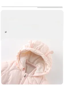 Detail of pink floral embroidery and ribbed collar on a hooded winter baby romper