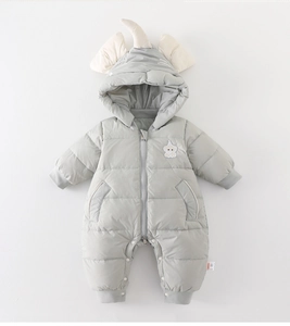 Detail of baby winter romper with snap buttons crotch and warm ribbed cuffs
