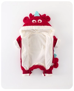 Detailed view of red plush baby dragon romper with soft fur trim and 3D horns