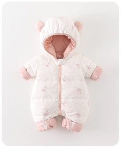 Detailed view of baby snowsuit with quilted floral fabric and cute bear ear hood