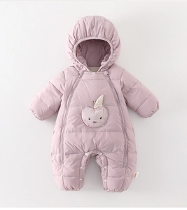 Detail of baby snowsuit showing apple embroidery and quilted warm winter fabric